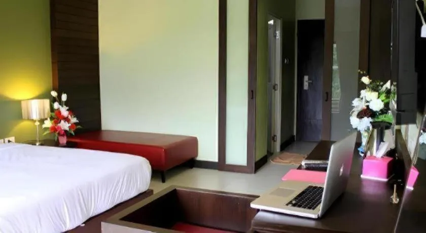 Bed in Villa Thiwa Hotel