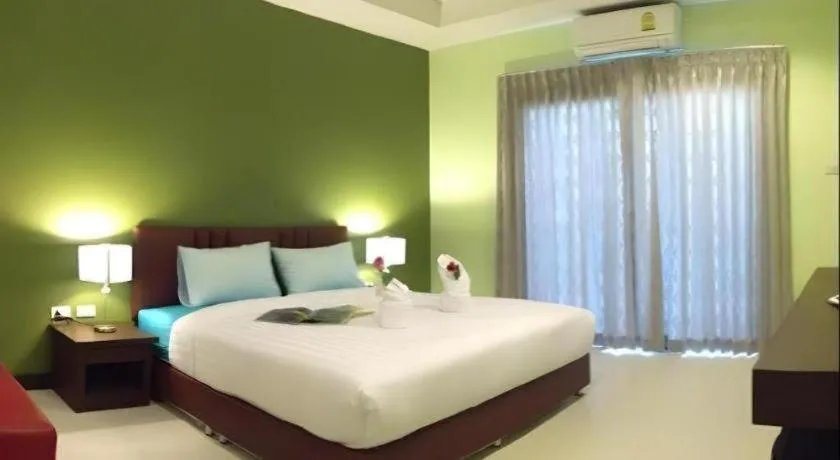 Bed in Villa Thiwa Hotel