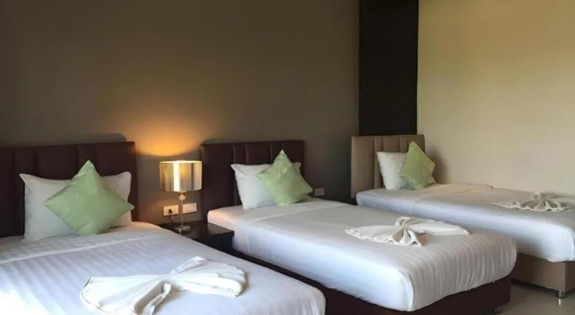 Bed in Villa Thiwa Hotel