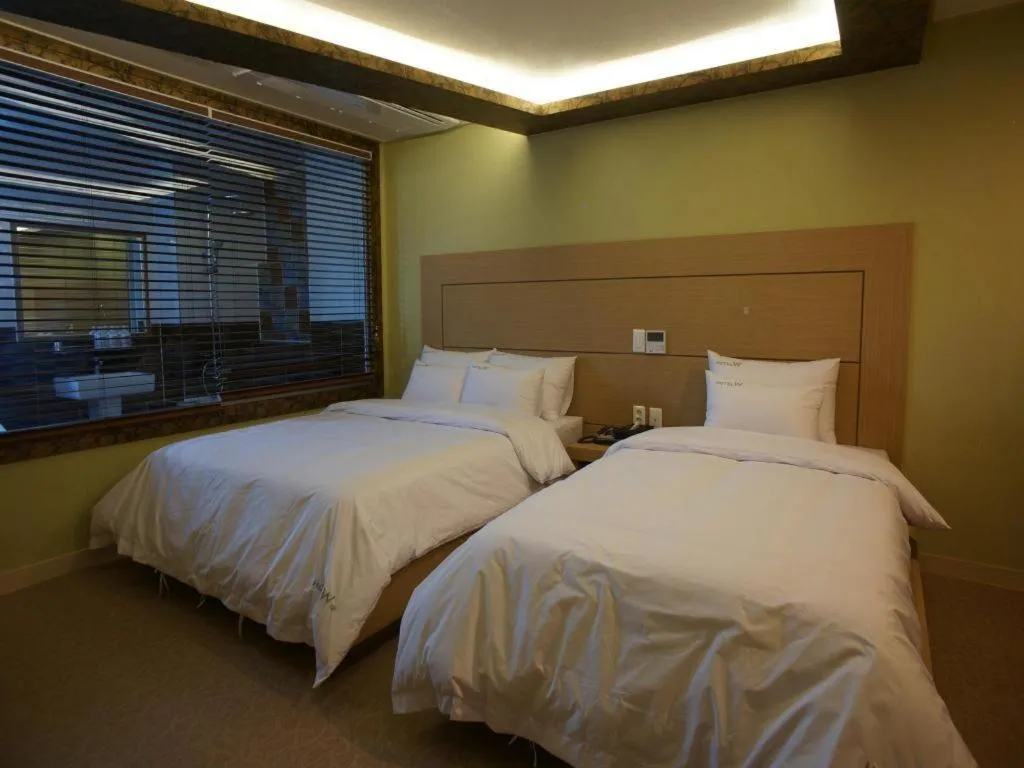 Bed in Hotel W Shinjeju