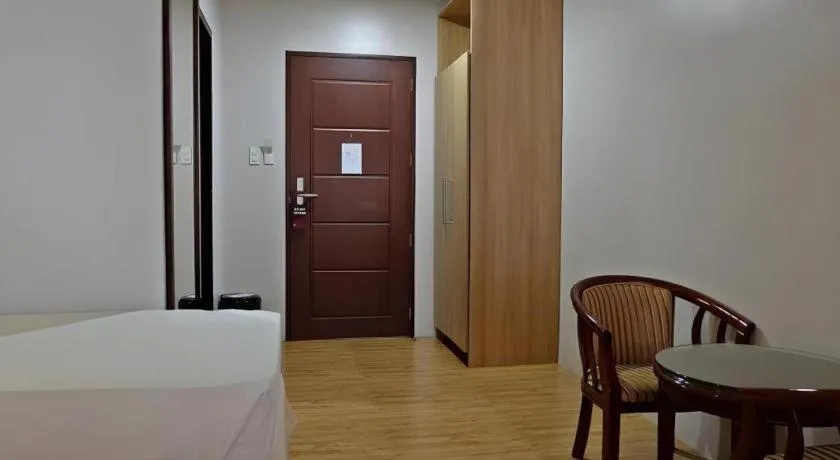 Bed in Capitol Central Hotel and Suites