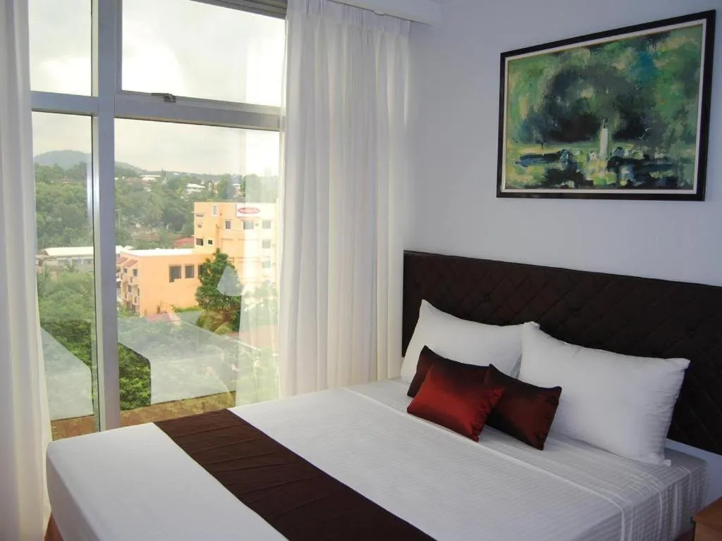 Bed in Capitol Central Hotel and Suites