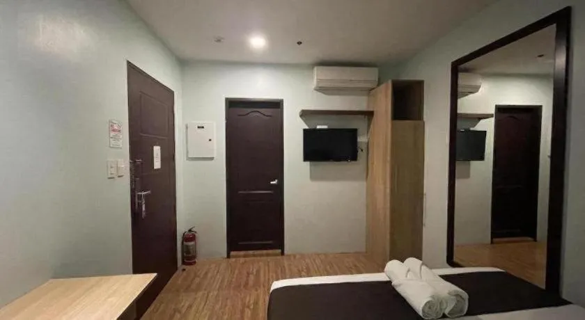 Bed in Capitol Central Hotel and Suites