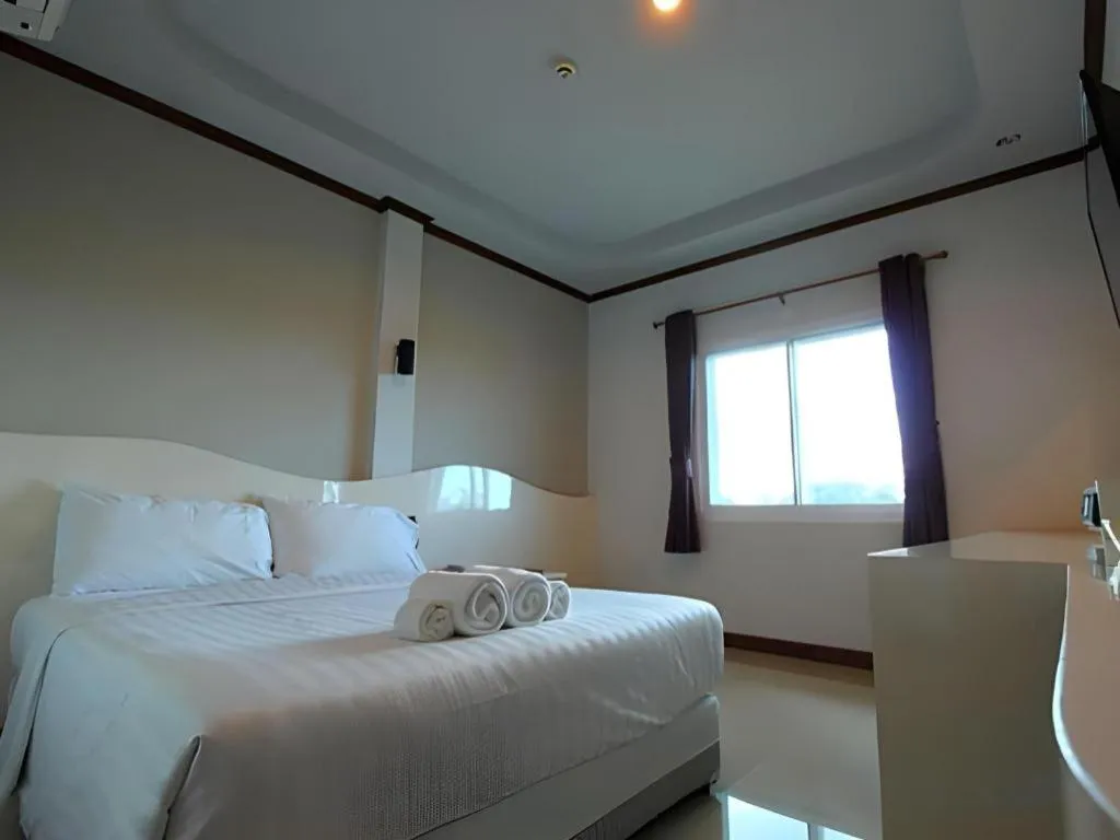 Bed in Thada Chateau Hotel