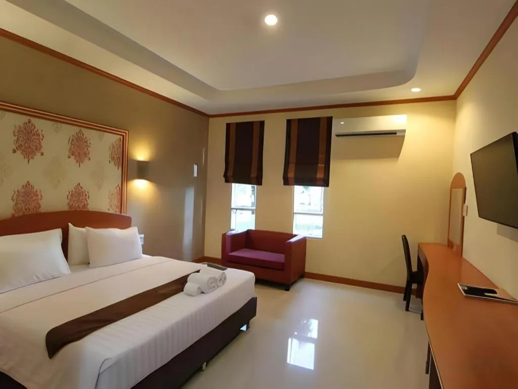 Bed in Thada Chateau Hotel