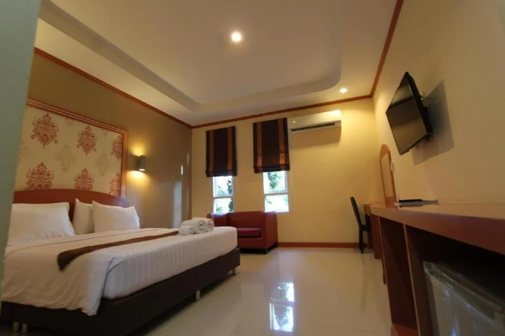 Bed in Thada Chateau Hotel