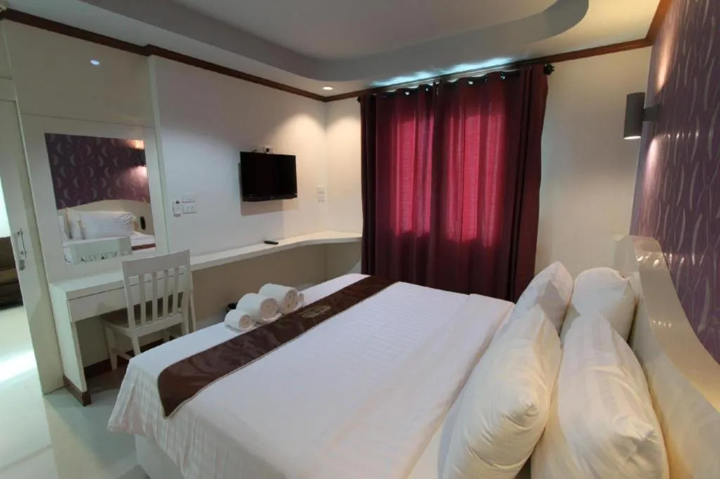 Bed in Thada Chateau Hotel