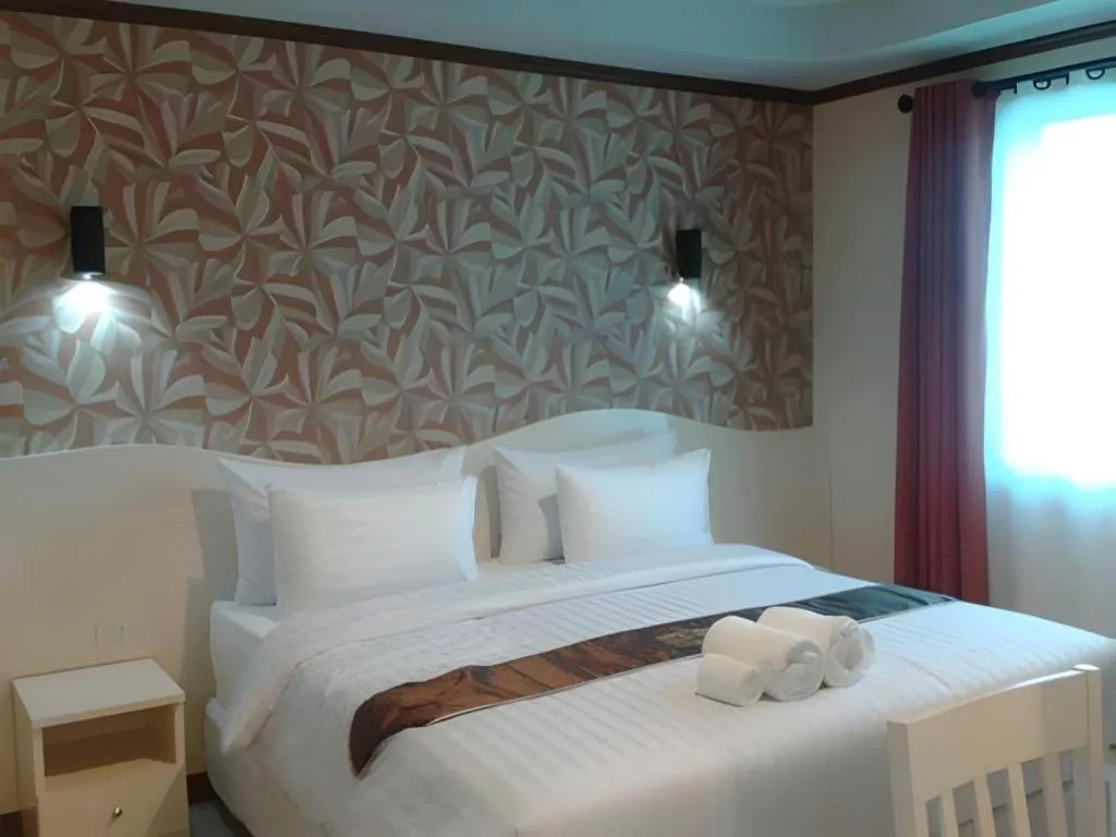 Bed in Thada Chateau Hotel