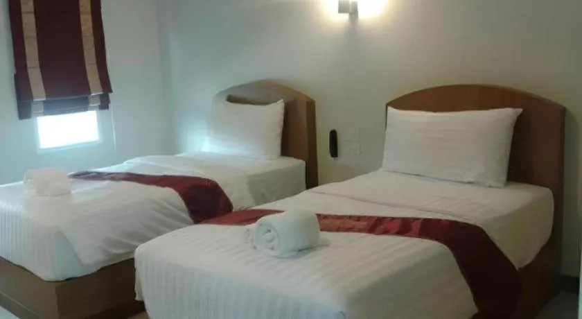 Bed in Thada Chateau Hotel