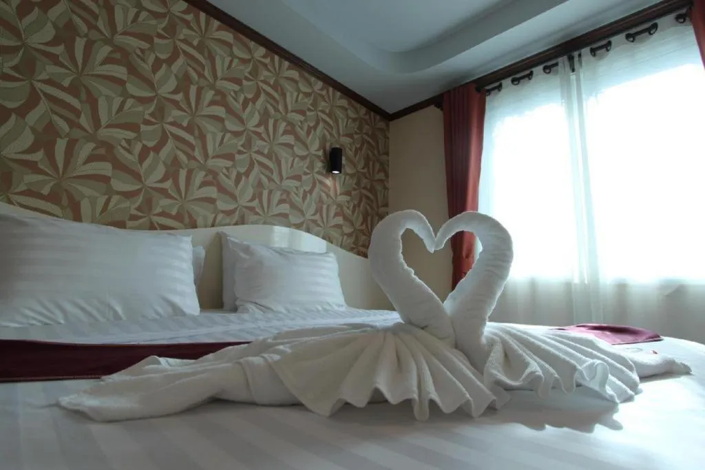 Bed in Thada Chateau Hotel