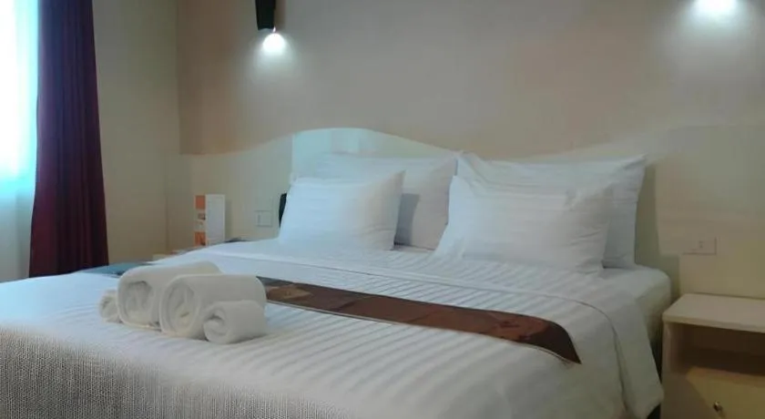 Bed in Thada Chateau Hotel