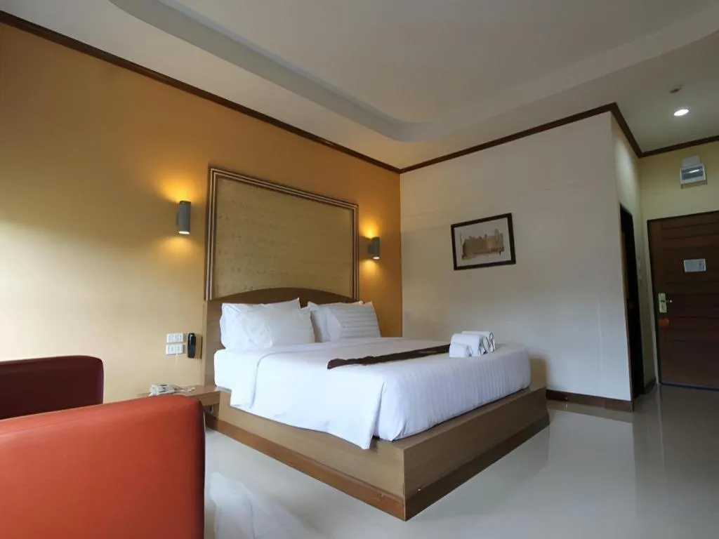 Bed in Thada Chateau Hotel