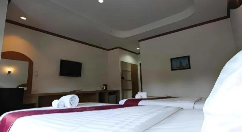 Bed in Thada Chateau Hotel