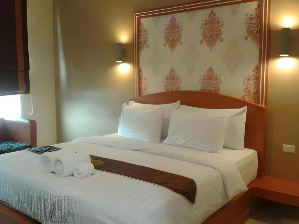 Bed in Thada Chateau Hotel