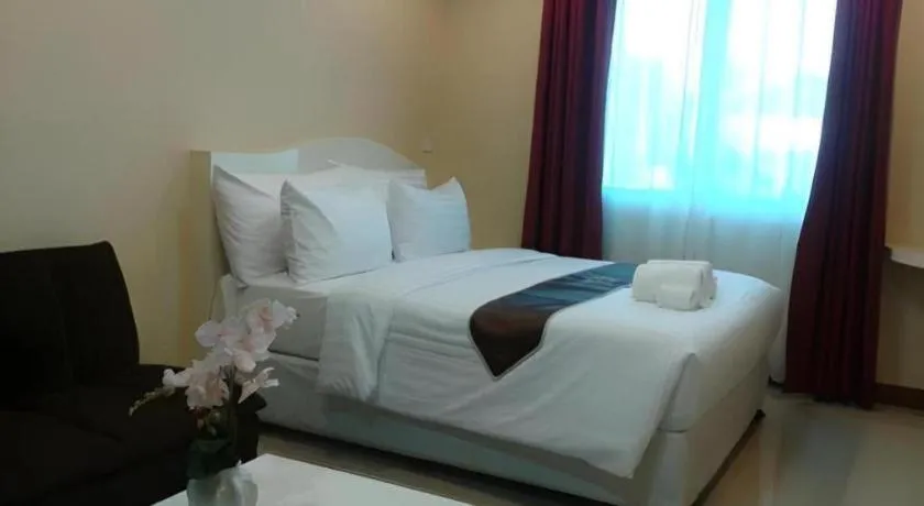 Bed in Thada Chateau Hotel