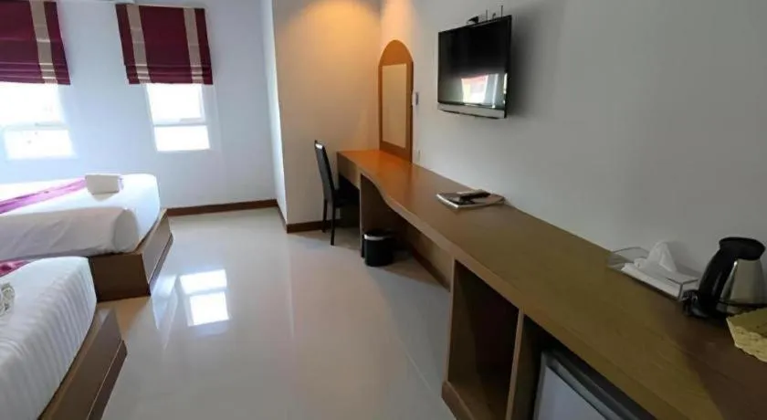 Bed in Thada Chateau Hotel