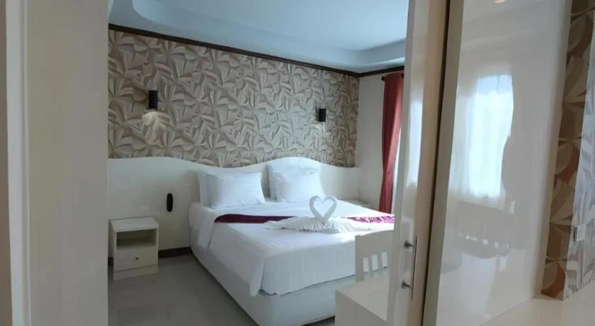 Bed in Thada Chateau Hotel