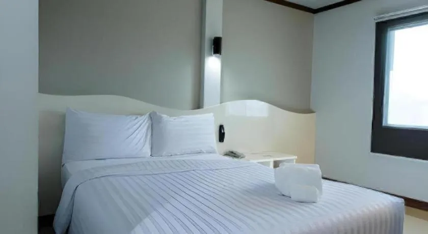 Bed in Thada Chateau Hotel