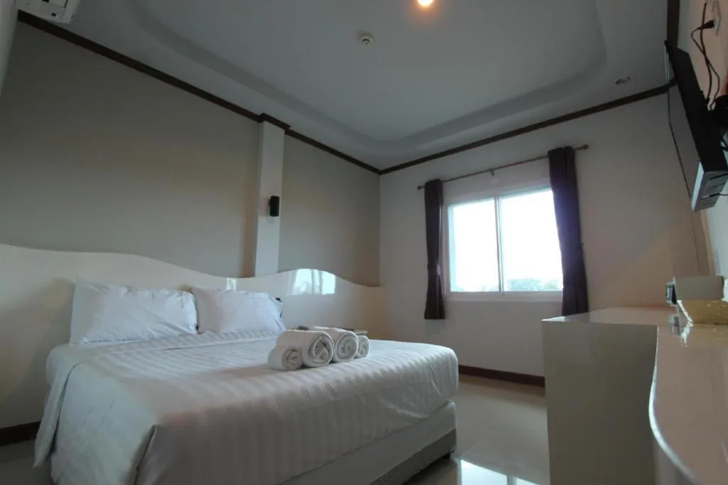 Bed in Thada Chateau Hotel