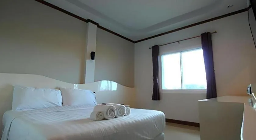 Bed in Thada Chateau Hotel