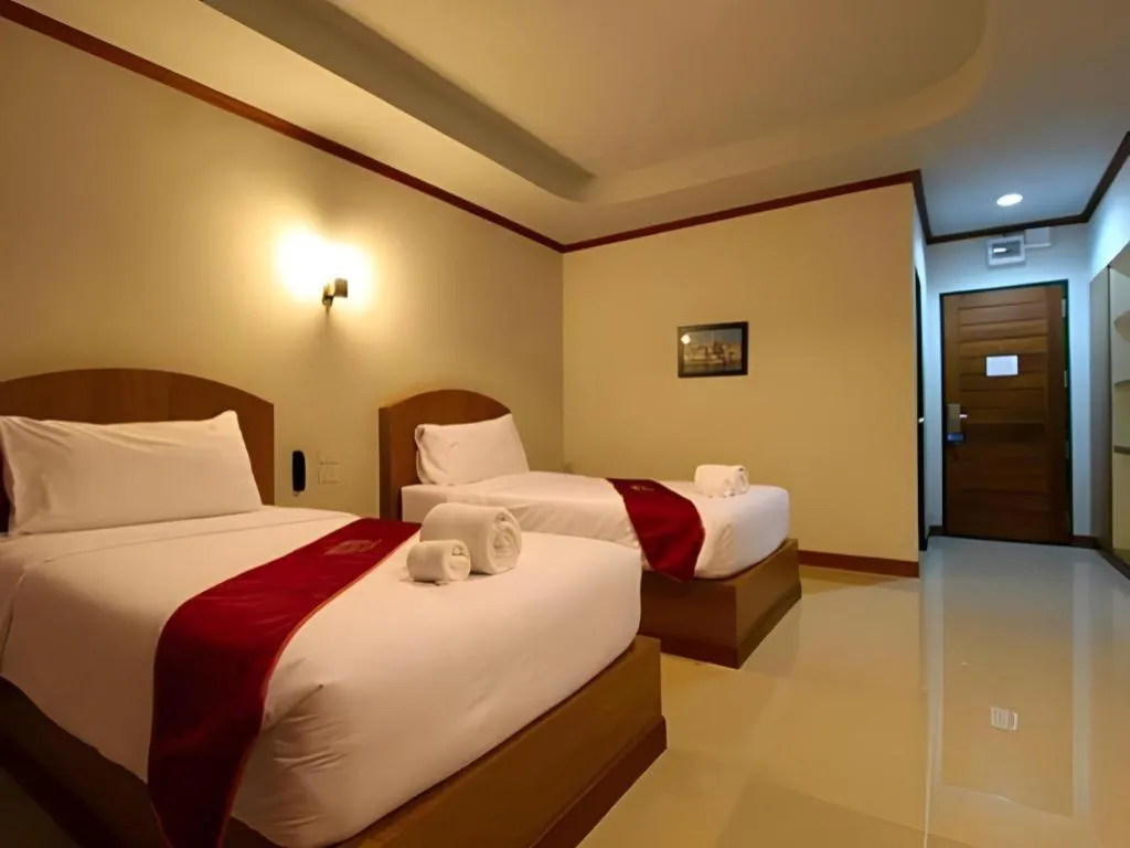 Bed in Thada Chateau Hotel