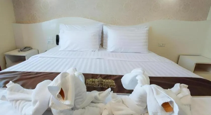 Bed in Thada Chateau Hotel