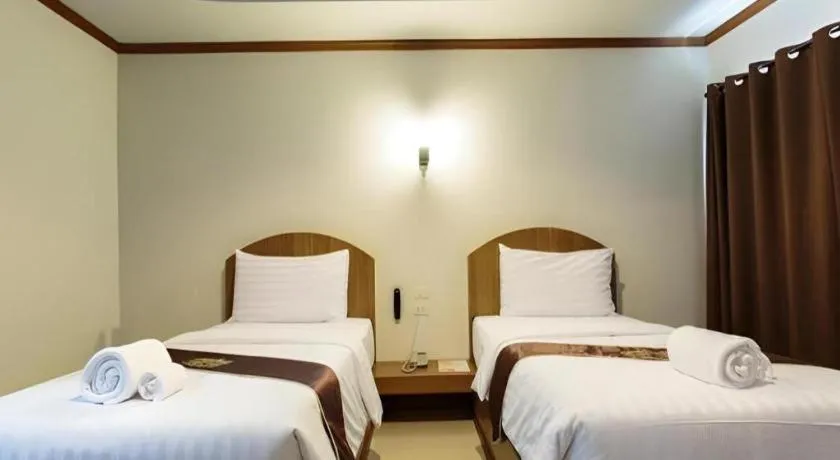 Bed in Thada Chateau Hotel