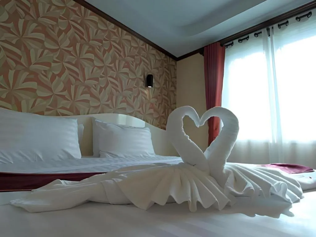 Bed in Thada Chateau Hotel