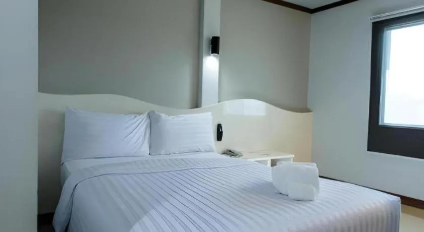 Bed in Thada Chateau Hotel