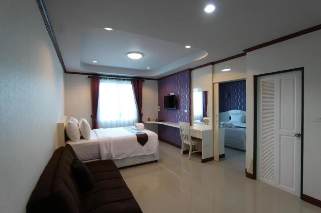 Bed in Thada Chateau Hotel