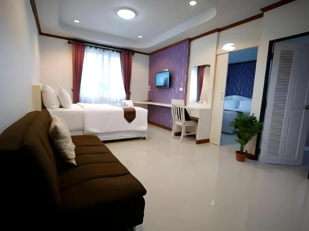 Bed in Thada Chateau Hotel