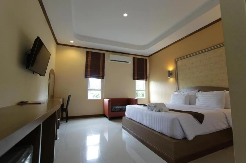 Bed in Thada Chateau Hotel