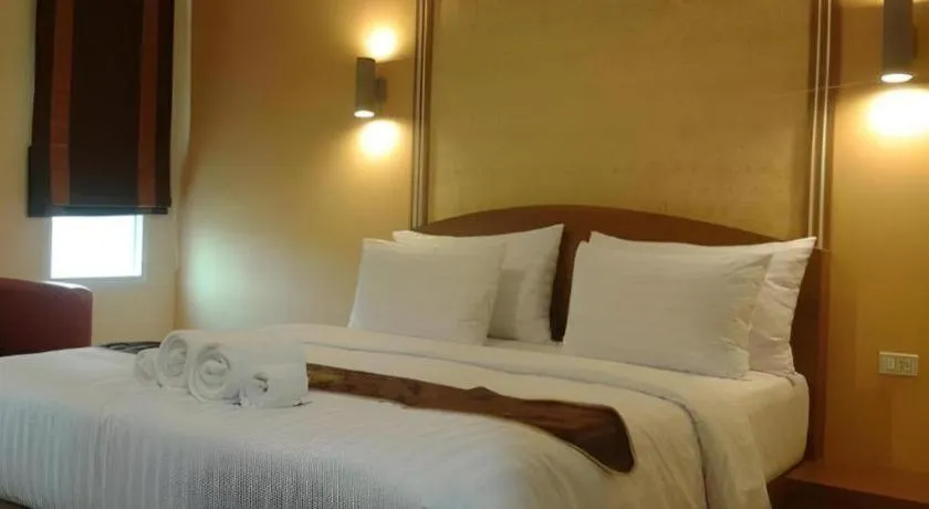 Bed in Thada Chateau Hotel