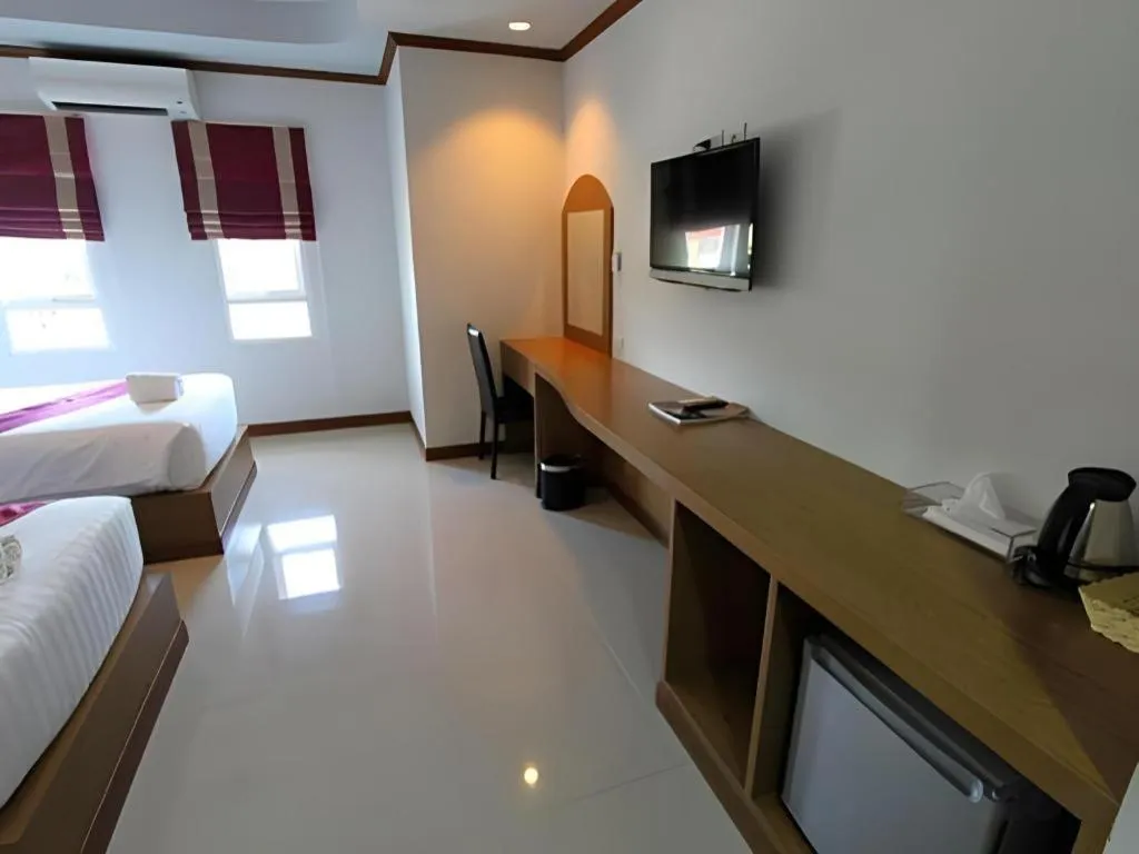 Bed in Thada Chateau Hotel