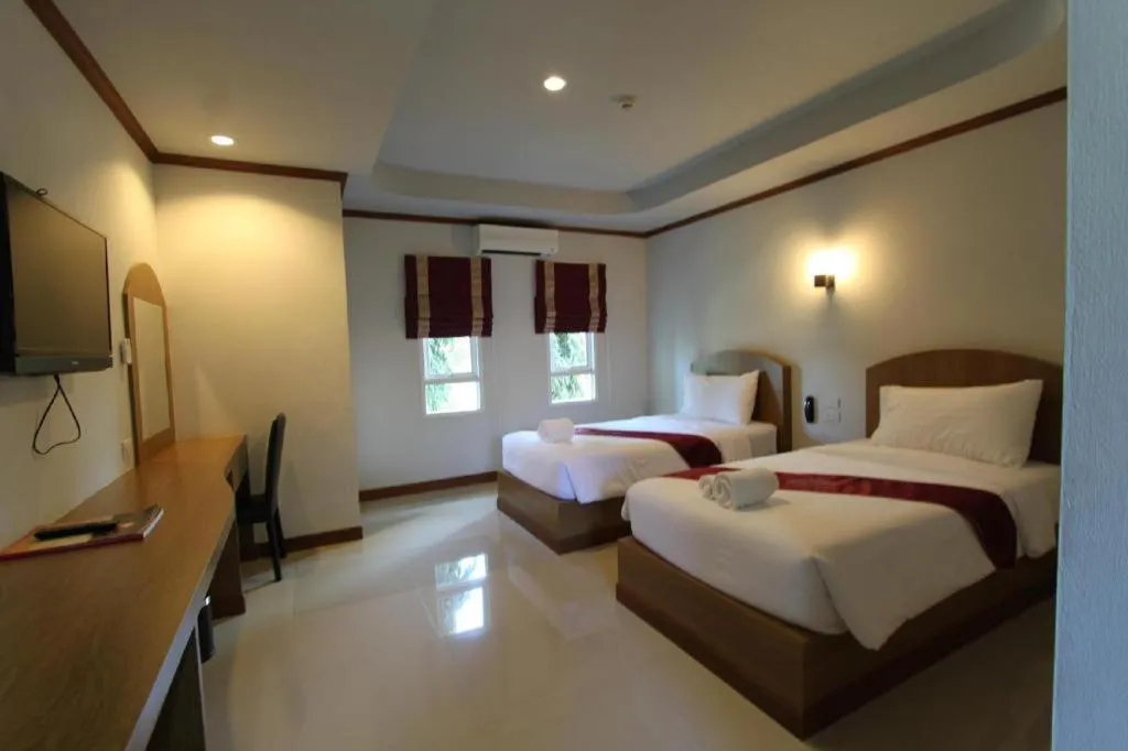 Bed in Thada Chateau Hotel