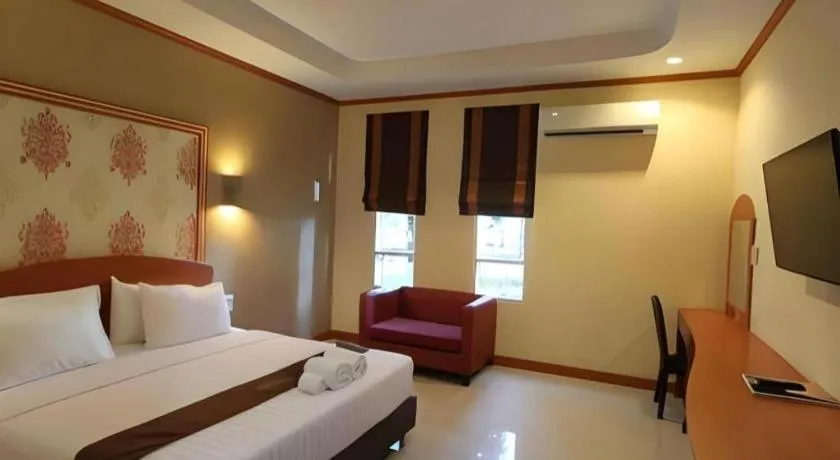 Bed in Thada Chateau Hotel