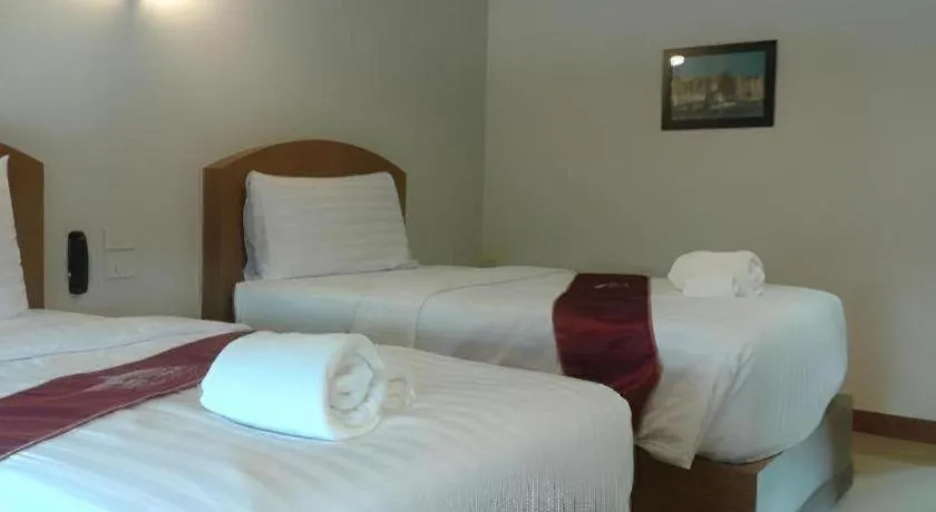 Bed in Thada Chateau Hotel