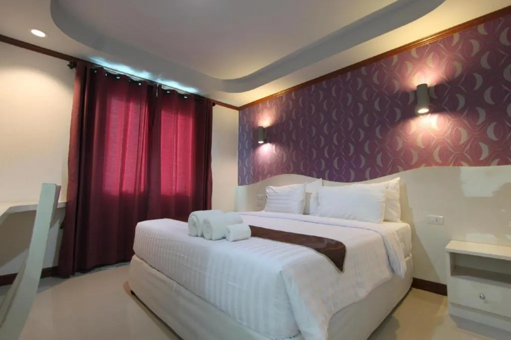 Bed in Thada Chateau Hotel