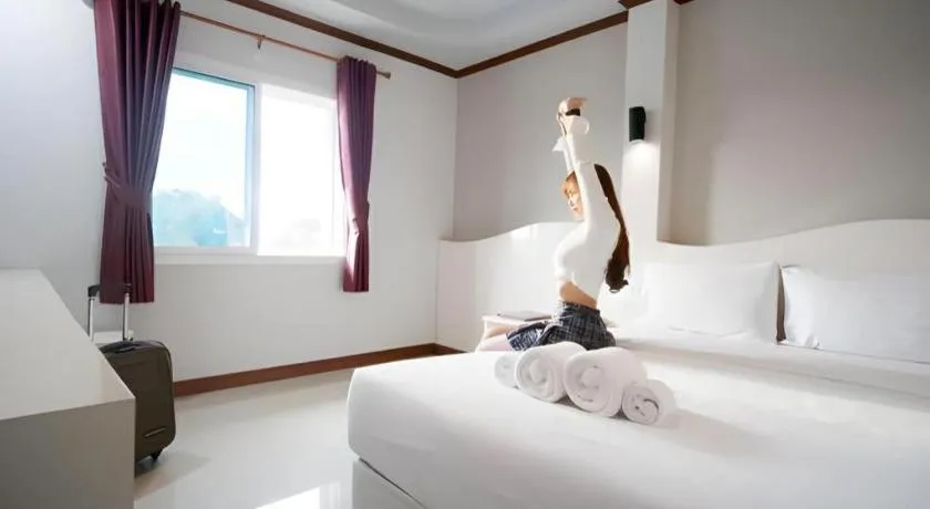 Bed in Thada Chateau Hotel