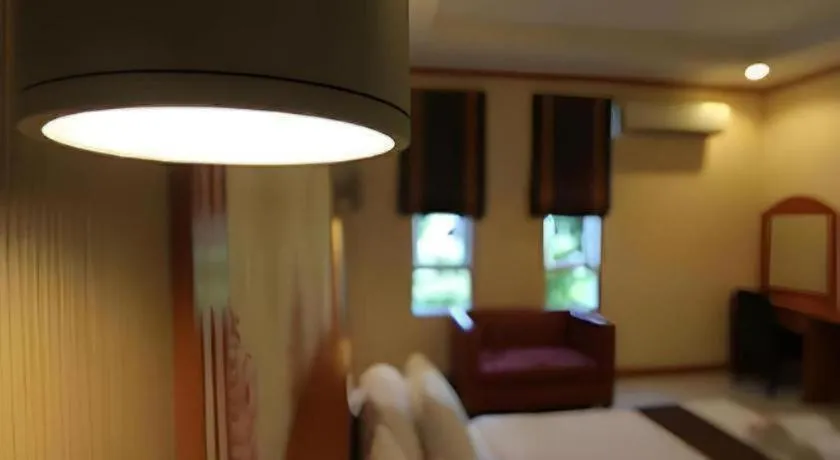 Bed in Thada Chateau Hotel