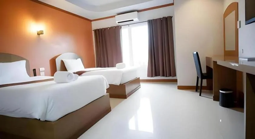 Bed in Thada Chateau Hotel