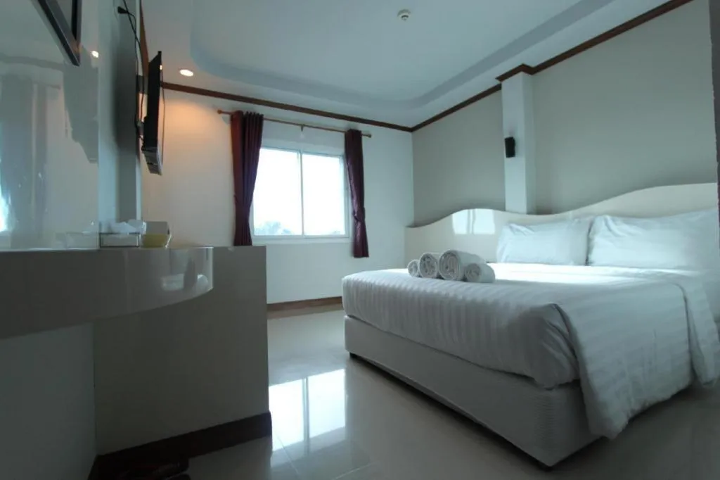 Bed in Thada Chateau Hotel