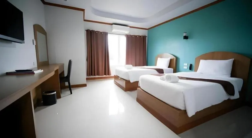 Bed in Thada Chateau Hotel