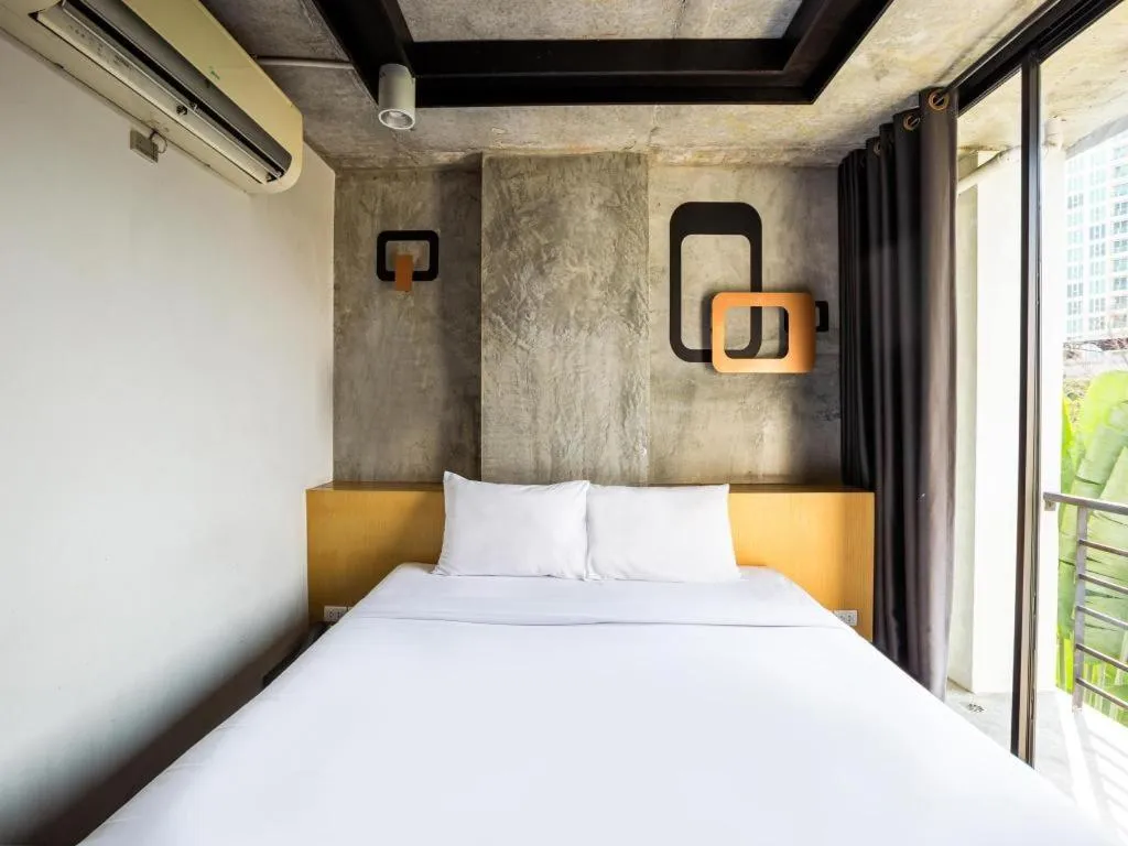 Bed in B2 South Pattaya Premier Hotel