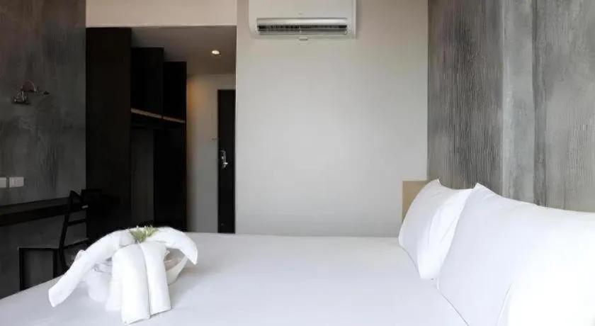 Bed in B2 South Pattaya Premier Hotel