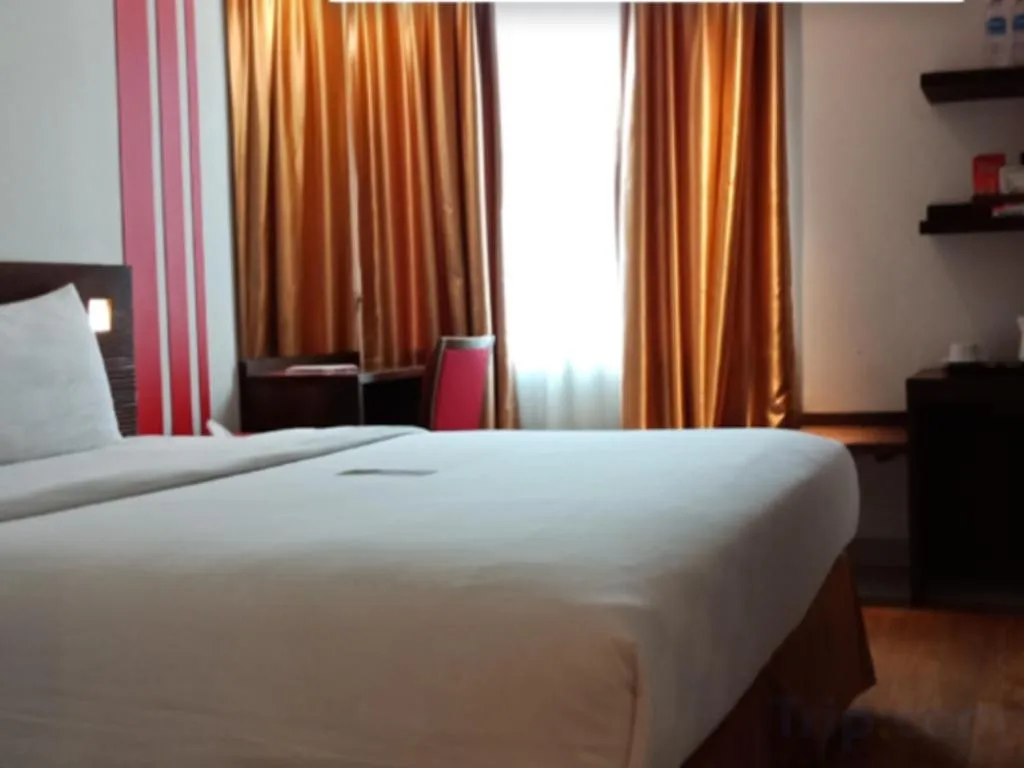 Bed in Redstar Hotel Jakarta