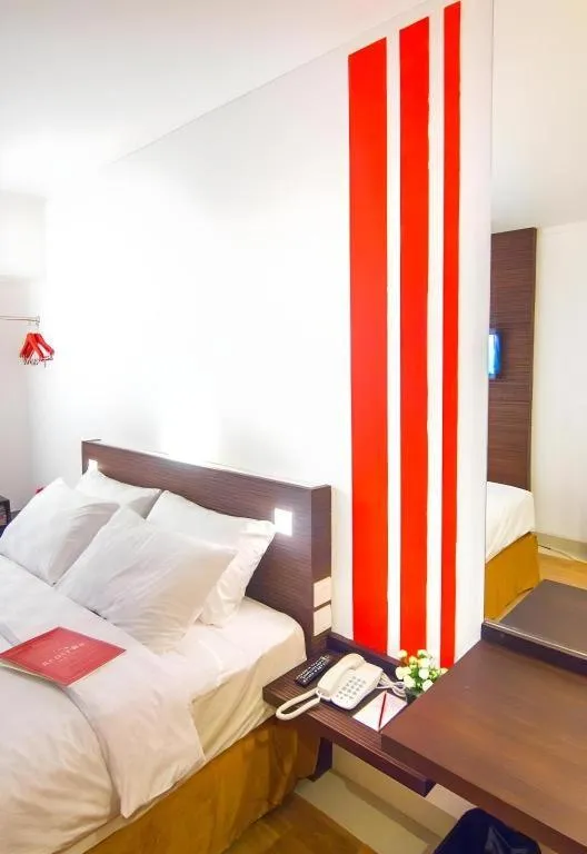 Bed in Redstar Hotel Jakarta