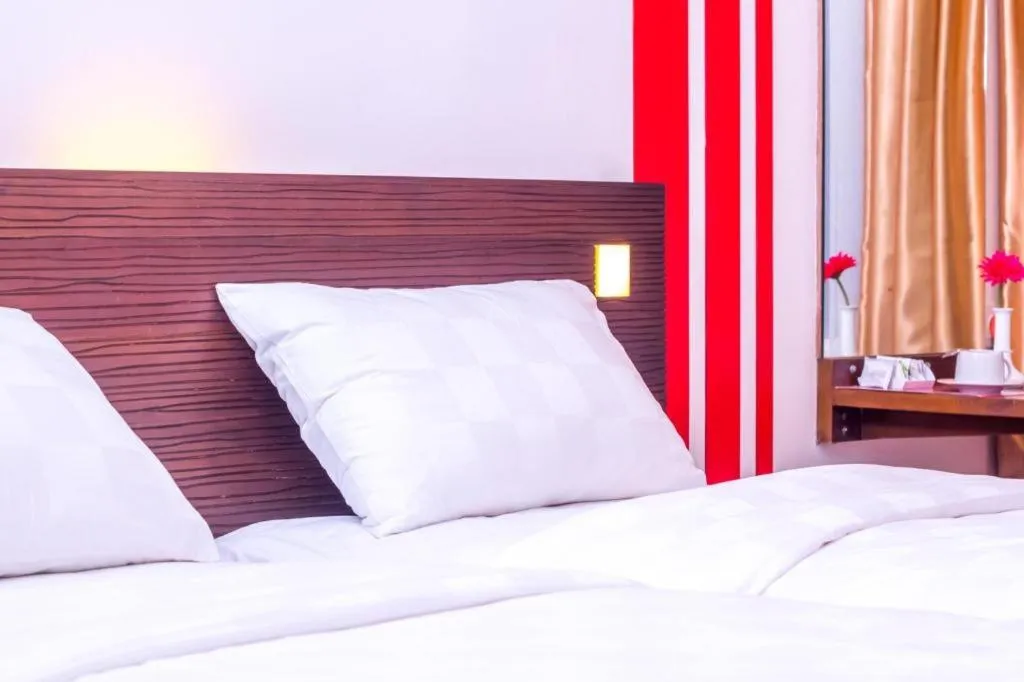 Bed in Redstar Hotel Jakarta