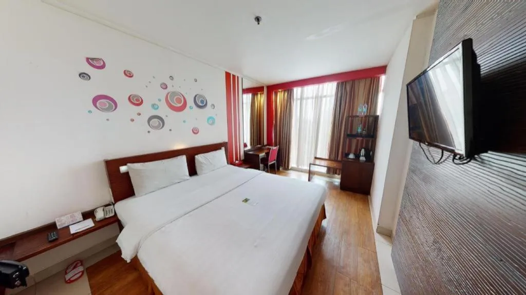 Bed in Redstar Hotel Jakarta