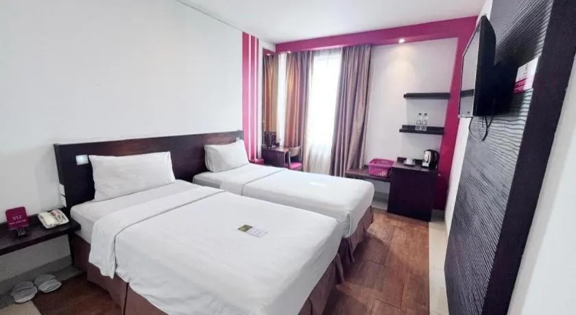 Bed in Redstar Hotel Jakarta